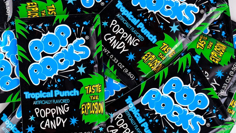 Packages of tropical punch flavored Pop Rocks candy