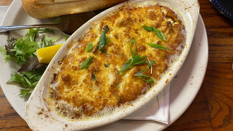 Bowl of crab dip on table