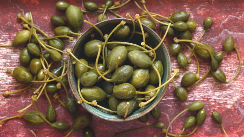 capers in scattered on table