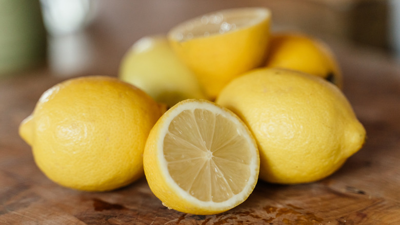 sliced and whole lemons