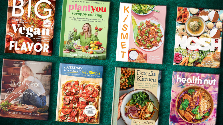 Vegetarian cookbooks on green background