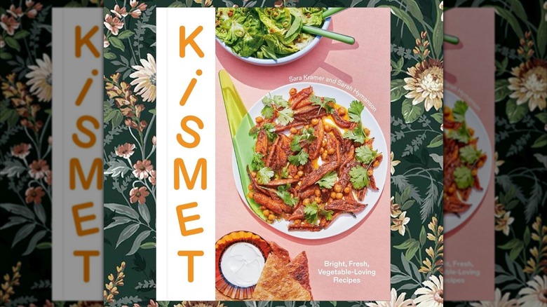 Kismet cover on green floral background