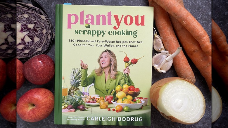 The book PlantYou with veggies around