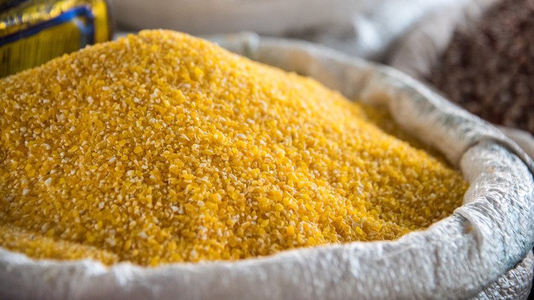 pile of cornmeal in sack