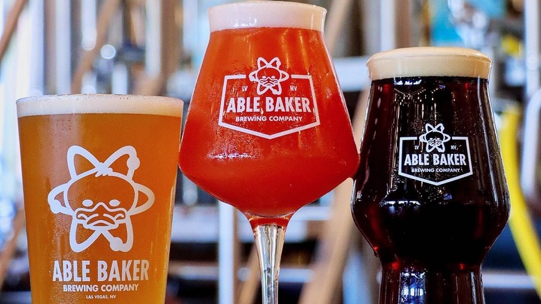 A group of Able Baker glasses filled with beer