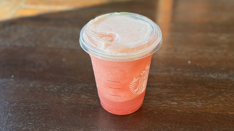 A takeout drink of a Starbucks Blended Strawberry Lemonade