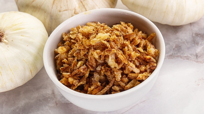 A bowl of dried onion flakes