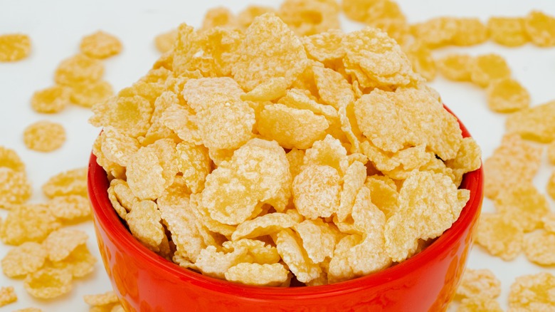 A red bowl of cornflakes