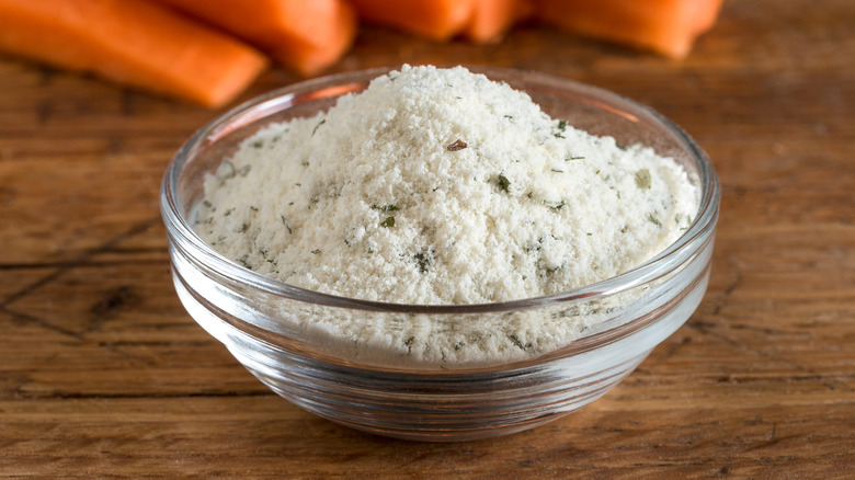 A glass bowl of ranch dressing seasoning