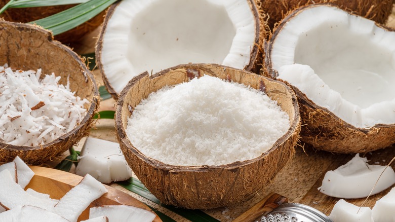 Coconut flakes in halved coconut shells