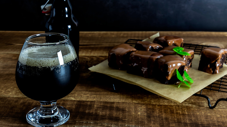 glass of stout and brownies