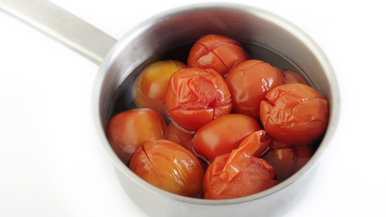 boiled tomatoes in pot