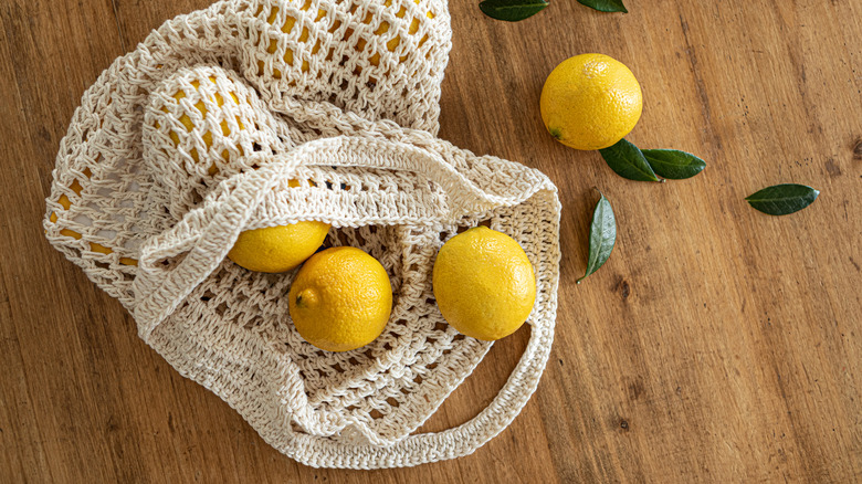 lemons in a netted bag