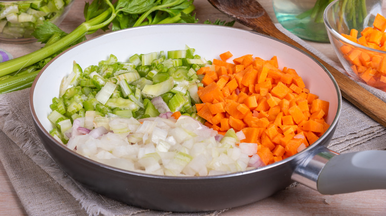 carrot, onion, and celery soffritto in pan
