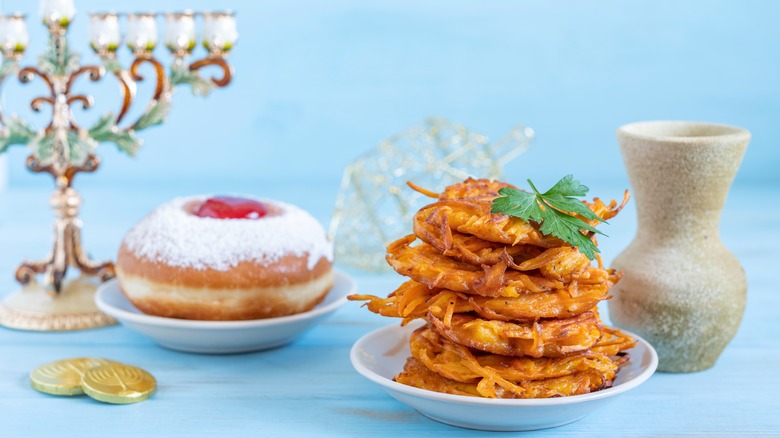 piled latkes and side of donuts 