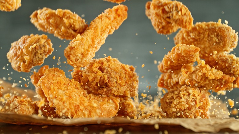 fried chicken falling from above