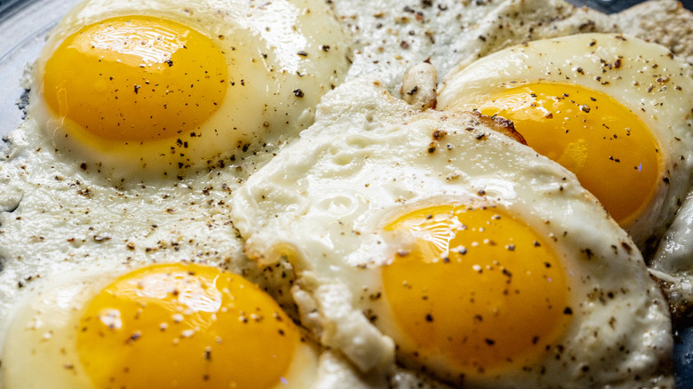 full frame of over-easy fried eggs