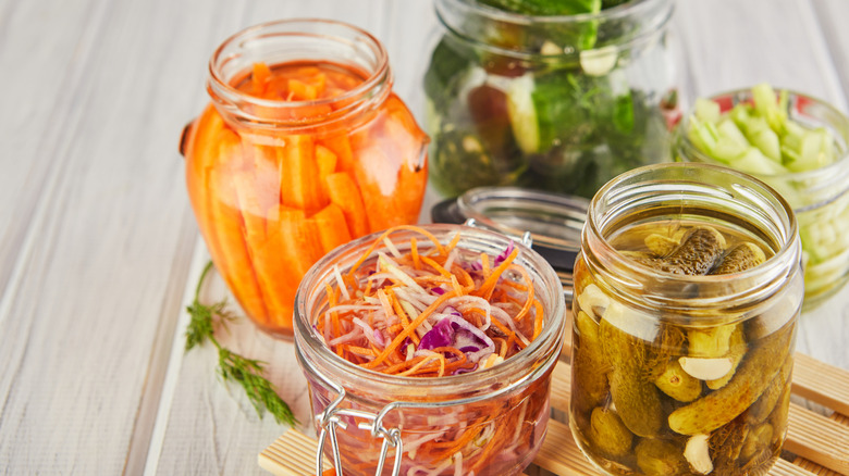 Glass jars with pickled vegetables