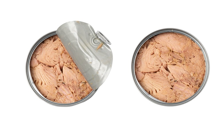 Two opened cans of tuna