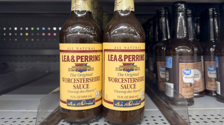 Bottles of Lea & Perrins Worcestershire sauce on a grocery store shelf