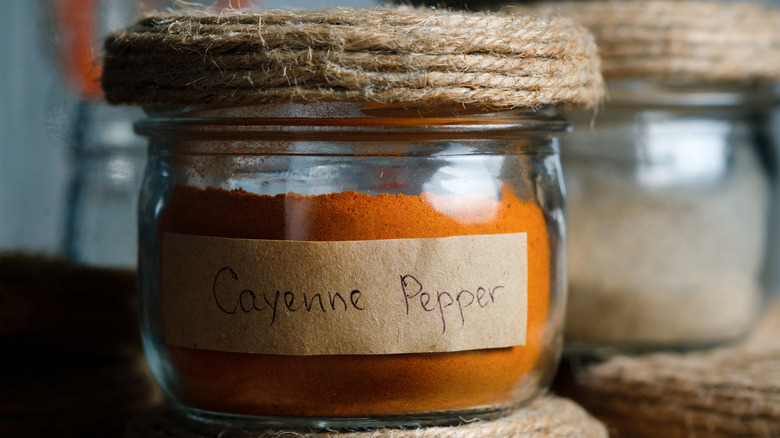 glass jar labeled cayenne pepper