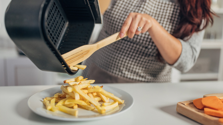 An air fryer with fries