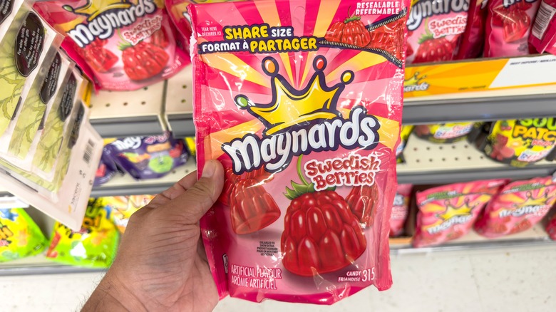 Hand holding Maynards Swedish Berries