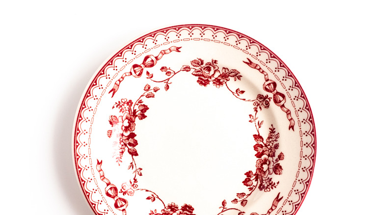 china serving dish with red patterns on white