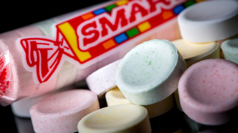 Smarties candy on black background