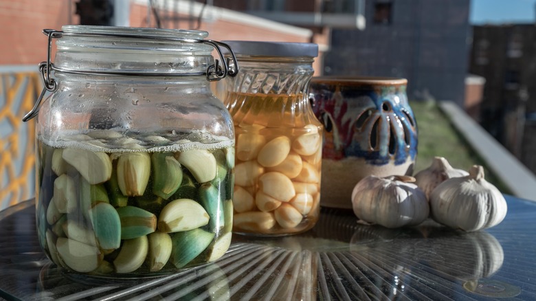 Jar of blue pickled garlic