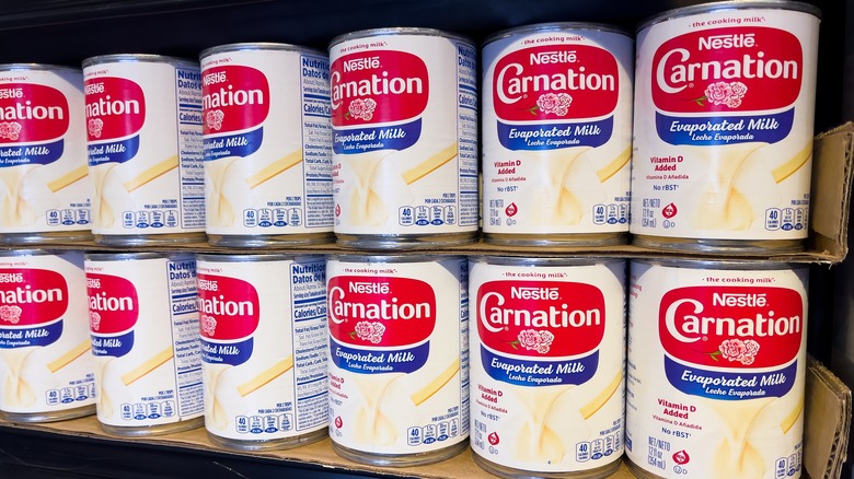 Evaporated milk cans on shelf