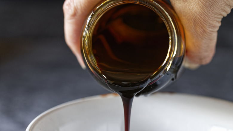 Pouring molasses into a bowl