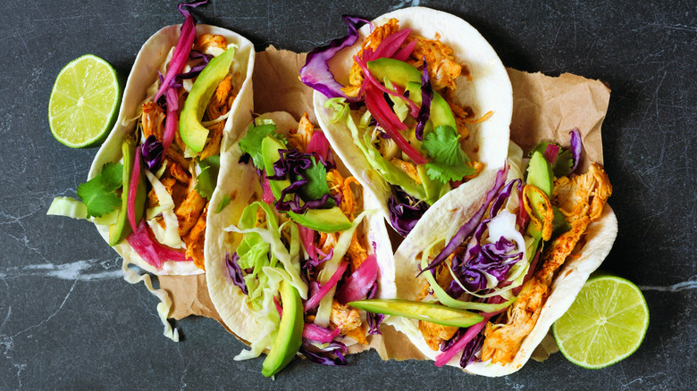 Tacos with cilantro lime slaw and avocado