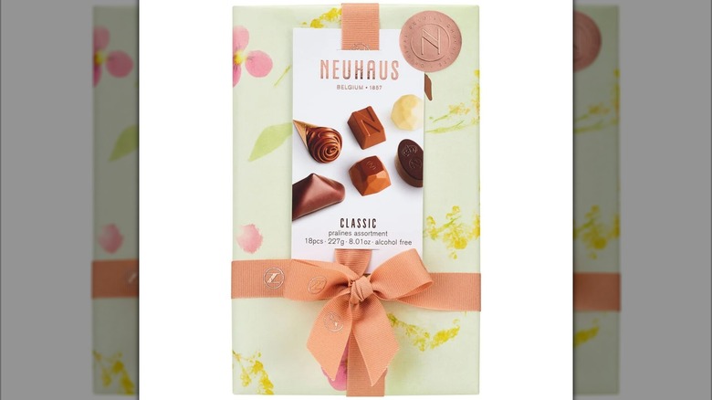 A box of Neuhaus chocolates on a white background