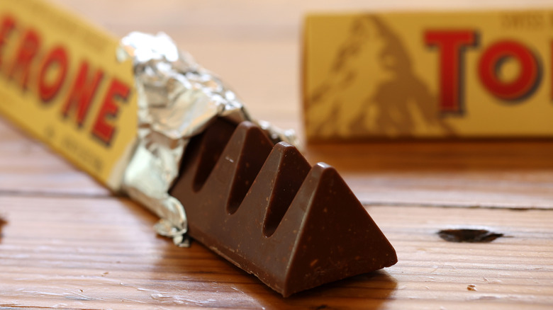 A half-open Tobleron bar on a wooden table