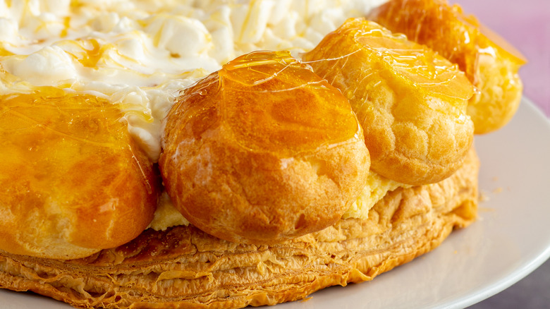 cream puffs atop puff pastry
