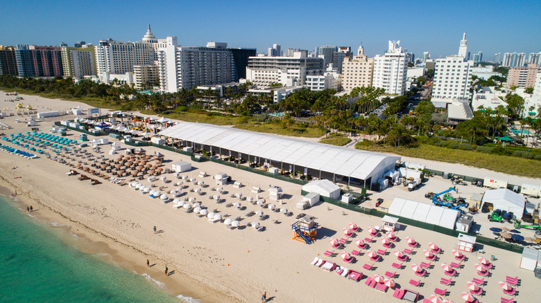 An aerial view of the South Beach Wine and Food Festival with tents set up along the beach