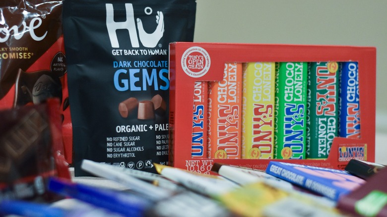 A selection of chocolate bars grouped together on a counter