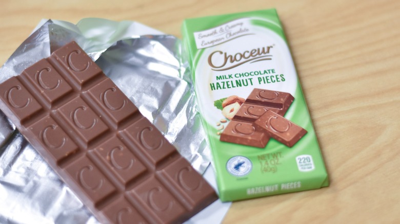 A Choceur milk chocolate with hazelnut pieces chocolate bar