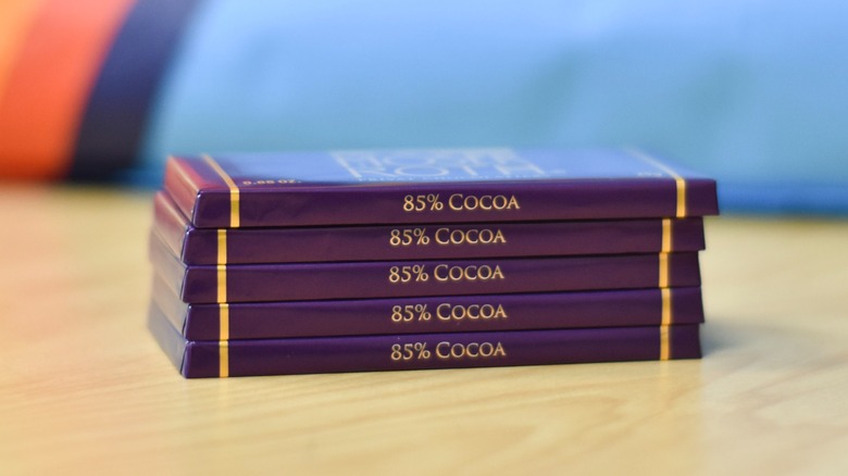 A stack of Moser Roth 85% cocoa bars