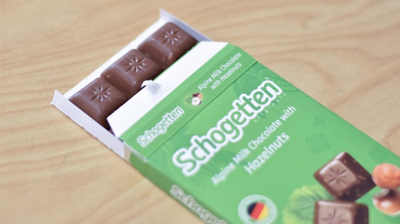 A Schogetten Alpine milk chocolate with hazelnuts chocolate bar