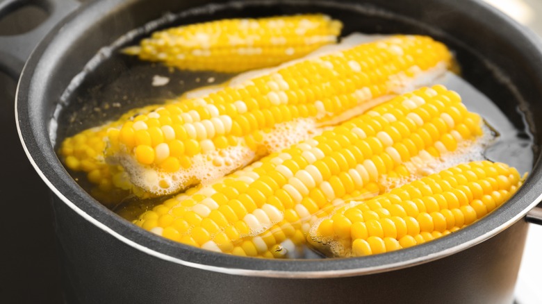 Corn cooking in a pot