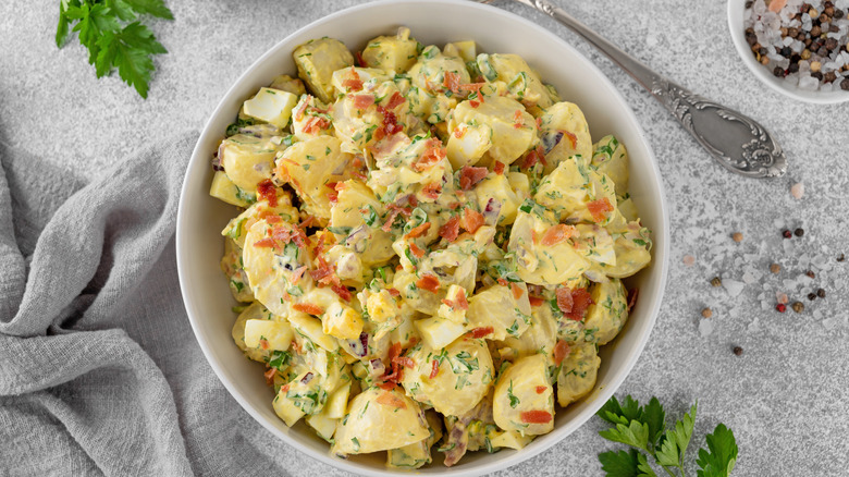 A classic potato salad with mayo, bacon, and eggs.