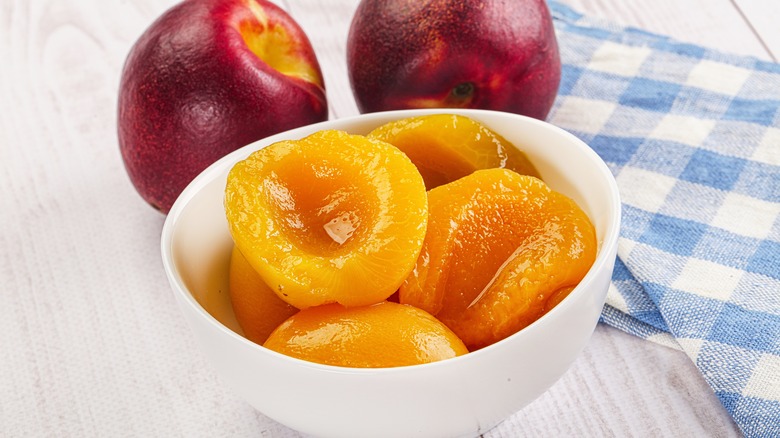 Bowl of canned peaches