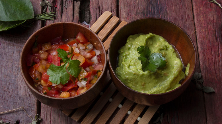 Bowls of pico de gallo and guacamole