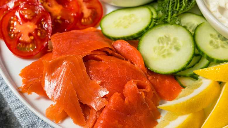 salmon lox platter with cucumbers