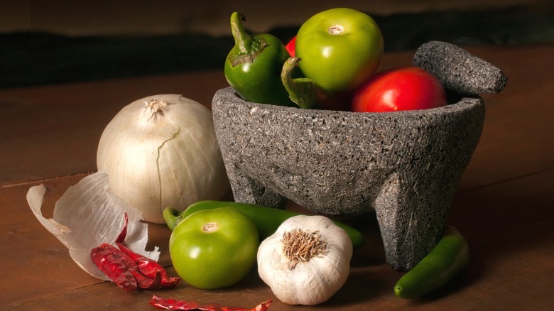 Salsa ingredients in molcajete