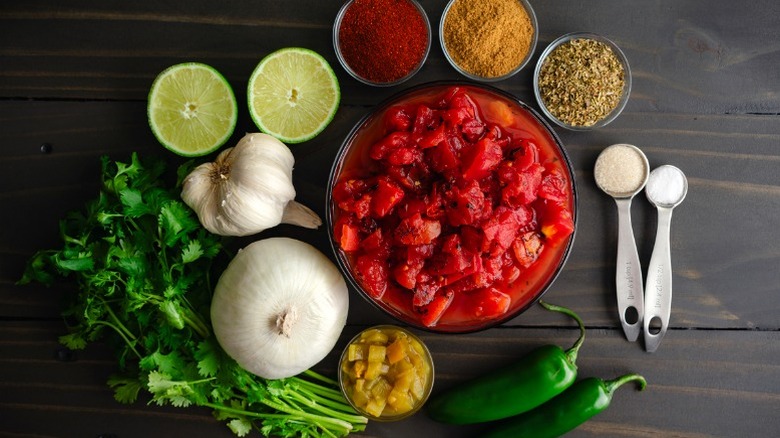 Salsa ingredients arranged on table