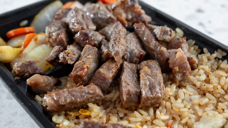 close up of prepared steak bowl