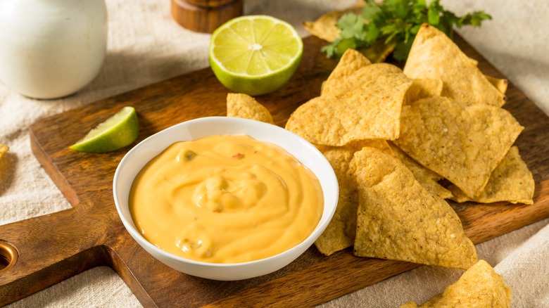 Tortilla chips with lime and queso